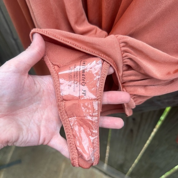 Free People Turnt Metallic Shiny Peach Orange V Neck Drapey Long Sleeve Bodysuit - Picture 10 of 13